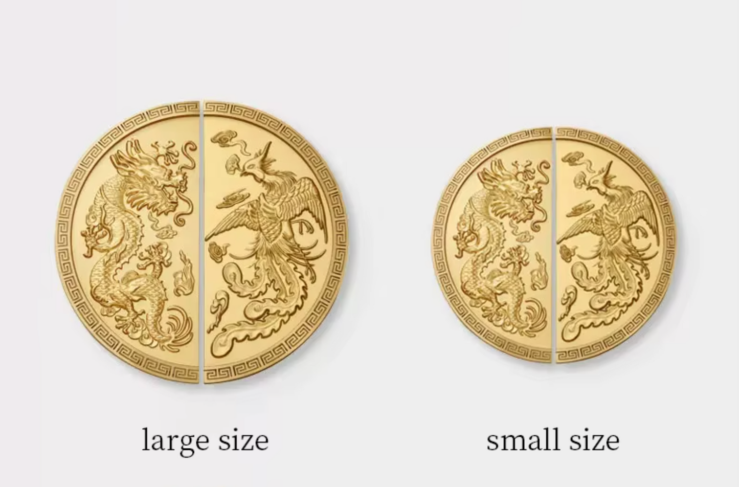 Two circular gold-toned decorative pieces shown side by side on a light gray background, labeled 'large size' and 'small size'. Each piece is split vertically into two halves, featuring an embossed dragon and phoenix design with a Greek key border.