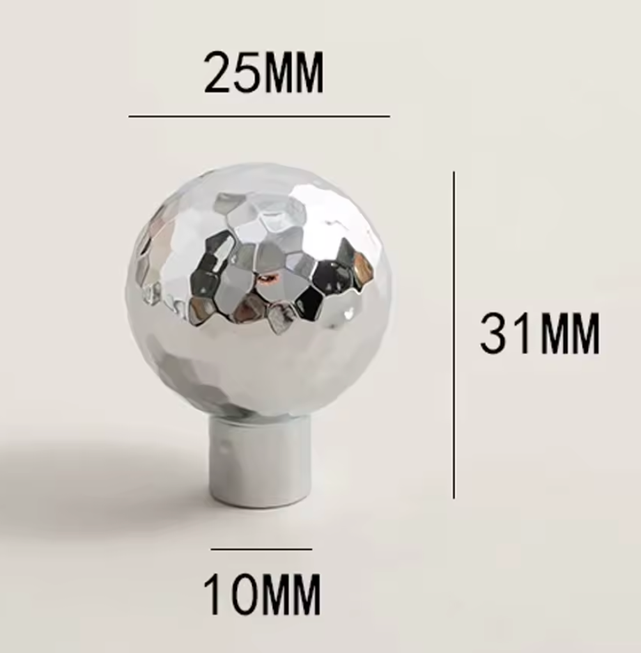 A chrome-faceted spherical knob on a light beige background with dimension labels showing 25mm width, 31mm height, and 10mm base.