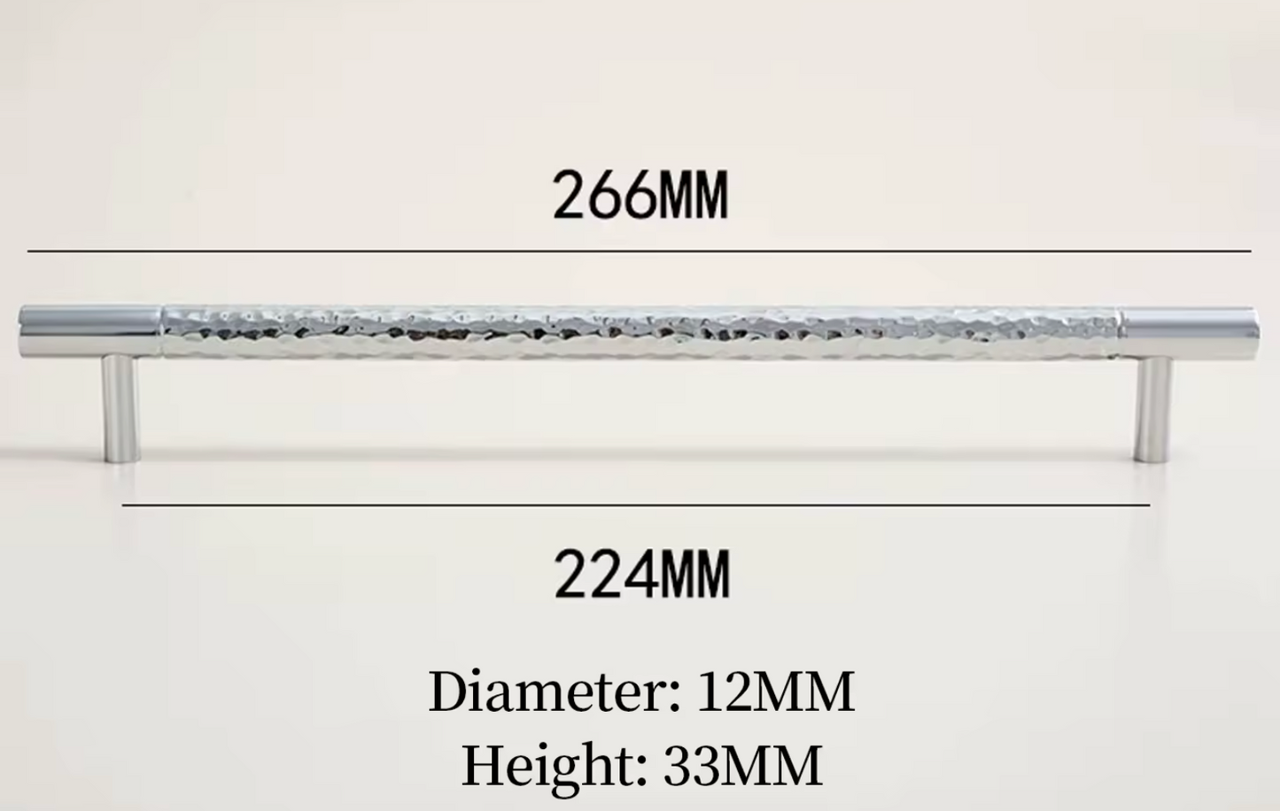 A long rectangular metal cabinet pull with a hammered texture and cylindrical side feet, shown on a light neutral background with dimension labels reading 266MM, 224MM, 12MM diameter, and 33MM height.