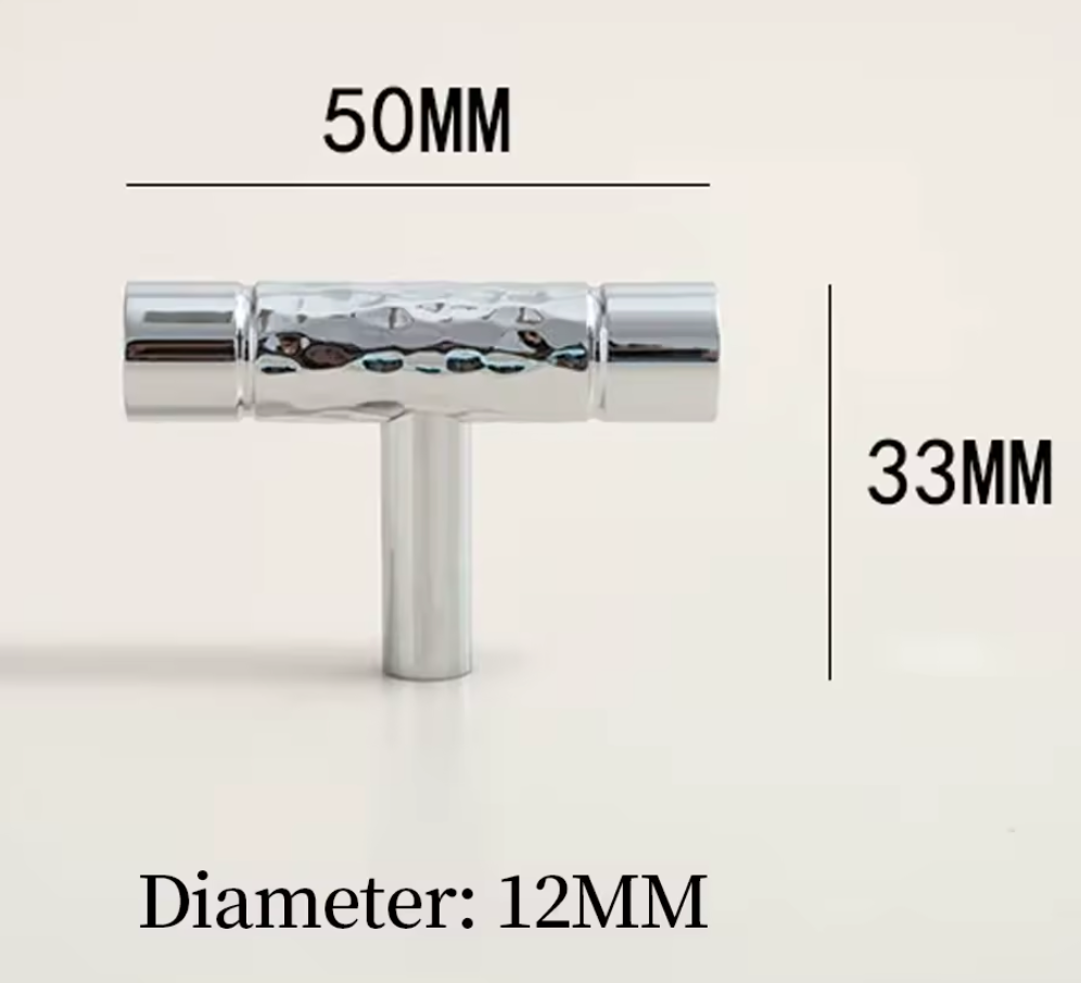 A chrome T-shaped hardware piece shown on a light beige background with overlaid dimension labels: 50MM across the top, 33MM on the right, and Diameter: 12MM at the bottom.