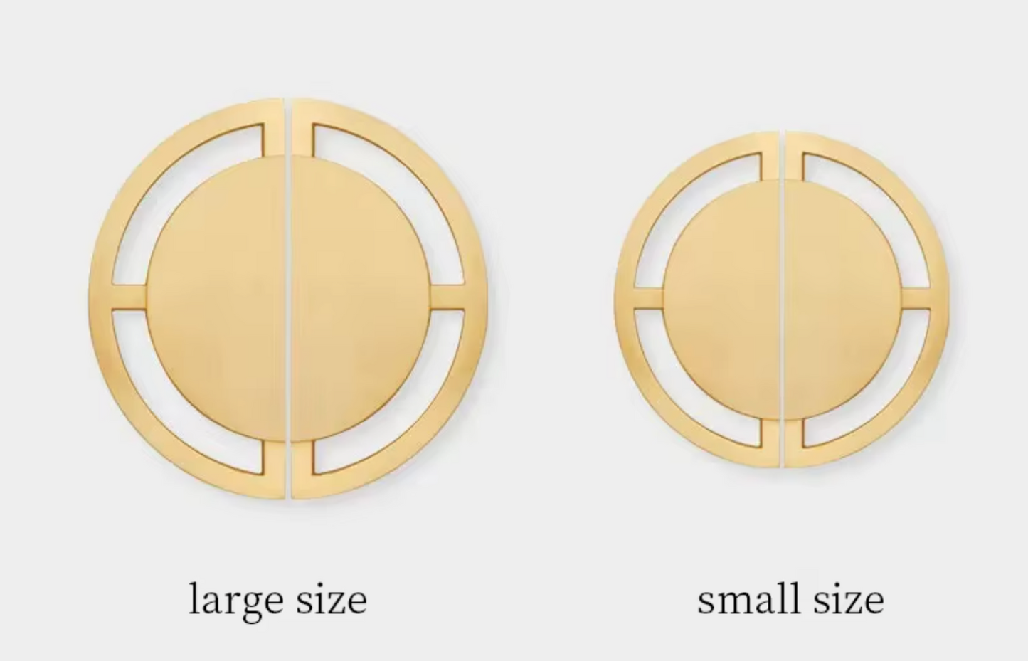 Two circular wall hooks shown side by side on a light gray background, labeled 'large size' and 'small size'. Both are metallic gold with a minimalist cutout design.