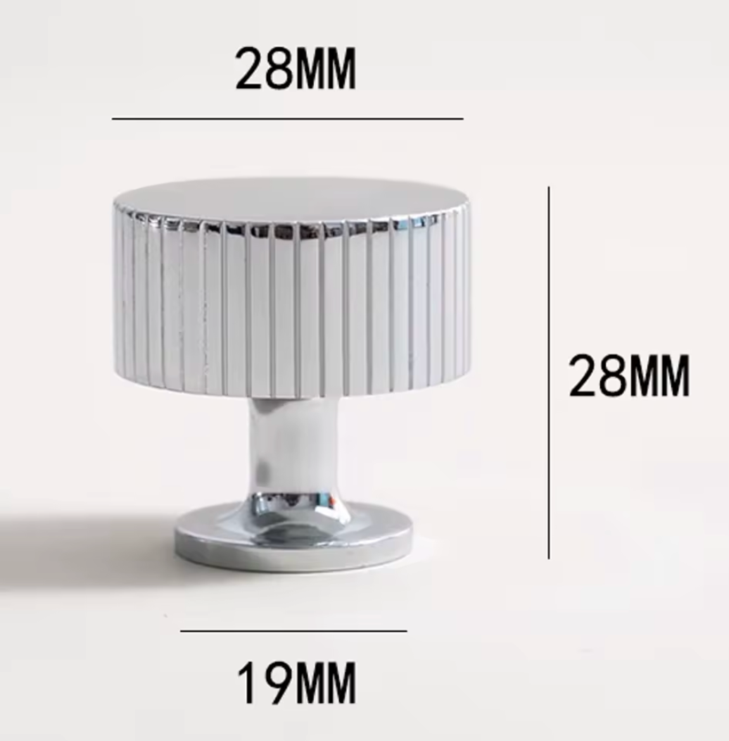 A chrome cabinet knob with a ribbed cylindrical head and a round base, shown on a light gray background with dimension labels indicating 28mm height/width and 19mm base width.