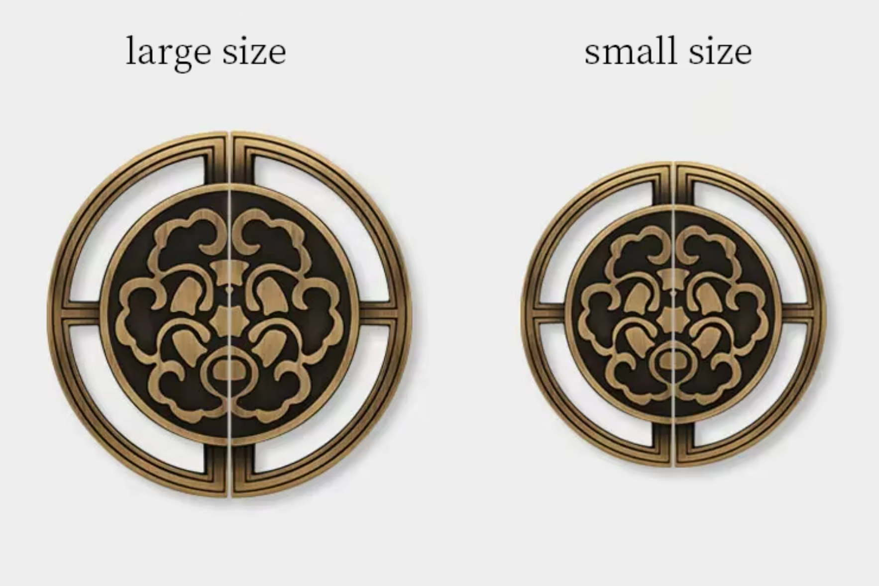 Two circular decorative hardware pieces shown side by side labeled 'large size' and 'small size' on a light gray background. Each piece has a gold-toned outer ring with a black center featuring an ornate cloud-like pattern.