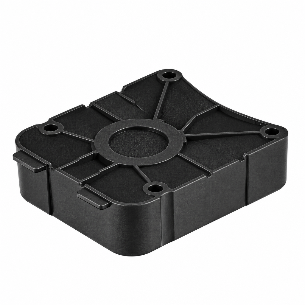 A black plastic square-shaped component or cover with a ribbed top surface and molded details, shown on a plain white background.