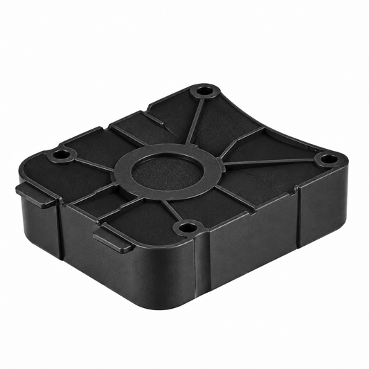 A black plastic square-shaped component or cover with a ribbed top surface and molded details, shown on a plain white background.